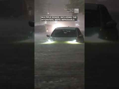 (Isaiah 28:2) Flooding in Dallas, Texas, strands cars, forcing water rescues